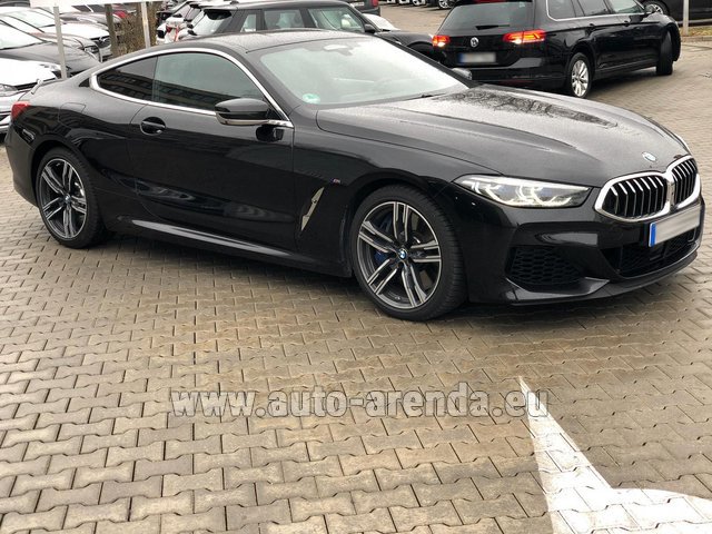 Rental BMW M850i xDrive Coupe in the Milan Central Train Station