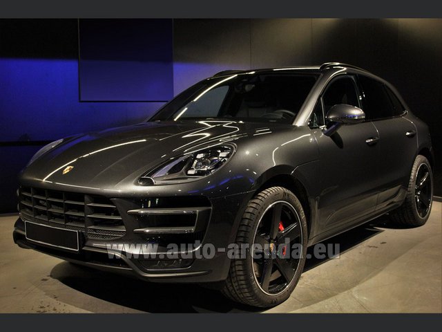 Rental Porsche Macan Turbo Performance Package LED Sportabgas in the Milan Central Train Station